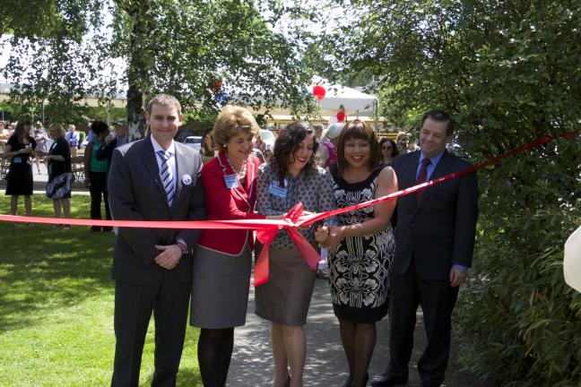 Officials cut the red ribbon to Centennial's brand new school-based health center.