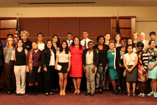 Commissioner Loretta Smith, Mayor Charlie Hales and Andrew McGough, the executive director of Worksystems pose with the 2014 class of SummerWorks interns.