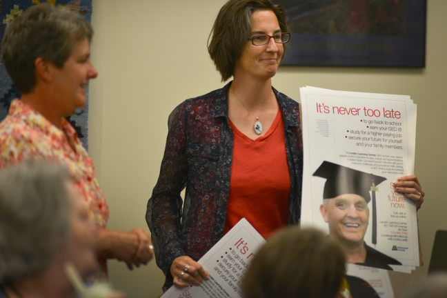 photo of Londer Learning Center open house and poster 