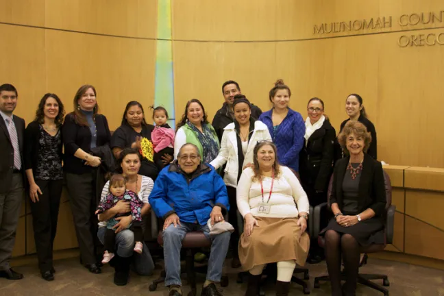 The Board of Commissioners, presenters and community members pose for a picture at the Nov. 6 proclamation. 