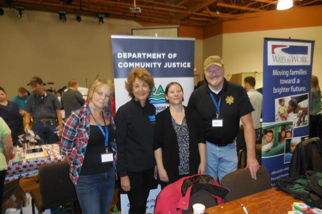 photo of East County Stand Down with Comm. McKeel and 3 DCJ staff