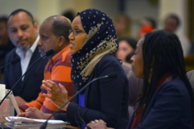 Members of the Oregon Health Equity Alliance testify before Commissioners