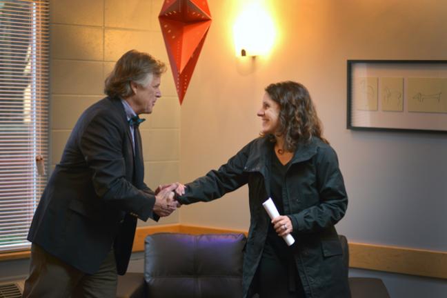 Derald Walker, Cascadia Behavioral Healthcare CEO (left) greets Chair Kafoury at the unveiling of the newly-renovated Harriet Court apartments.