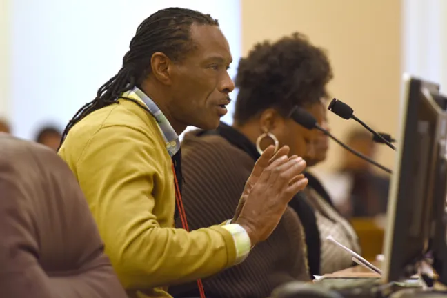 Maurice Evans of Cascade AIDS Project addresses the board during Thursday’s meeting.