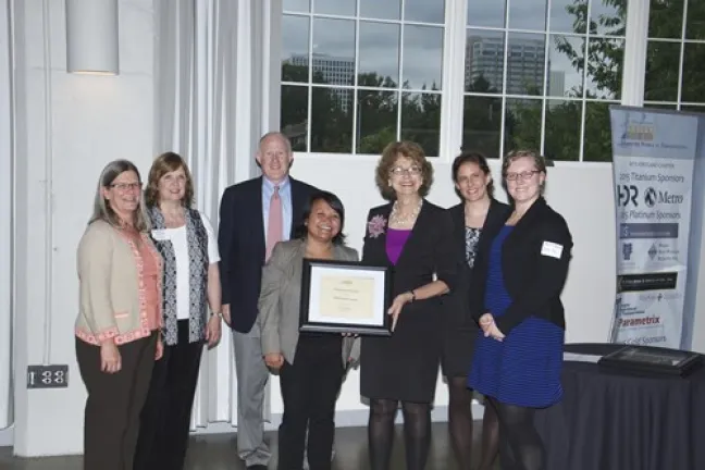 Commissioner Diane McKeel poses with award winners.