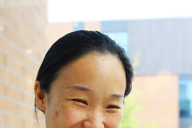 College student Lin Lin has access to healhy foods thanks to help she received from county employee Isaura Ascensio.