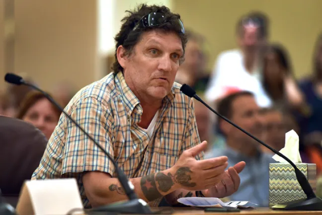 Gary Cobb of Central City Concern's Recovery Mentor Program address the board at Wednesday's budget hearing.