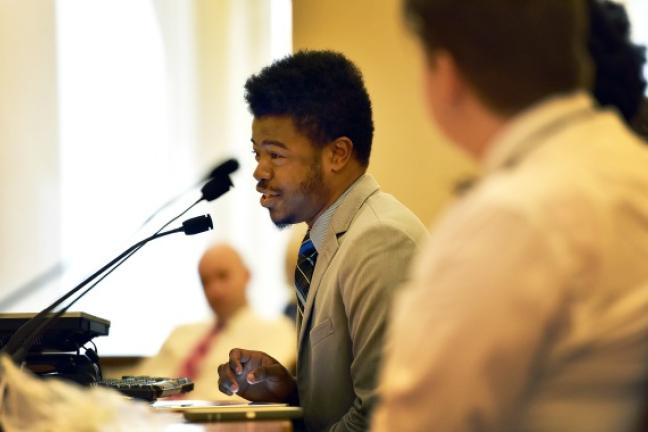 Giovanni Blair McKenzie tells the Board concerns about LGBTQ youth.