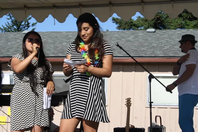 Elvia Angel-Silva (left) and Emily Villarreal-Herrera dedicated the peace pole in English and Spanish