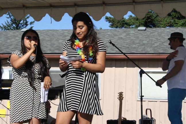 Elvia Angel-Silva (left) and Emily Villarreal-Herrera dedicated the peace pole in English and Spanish