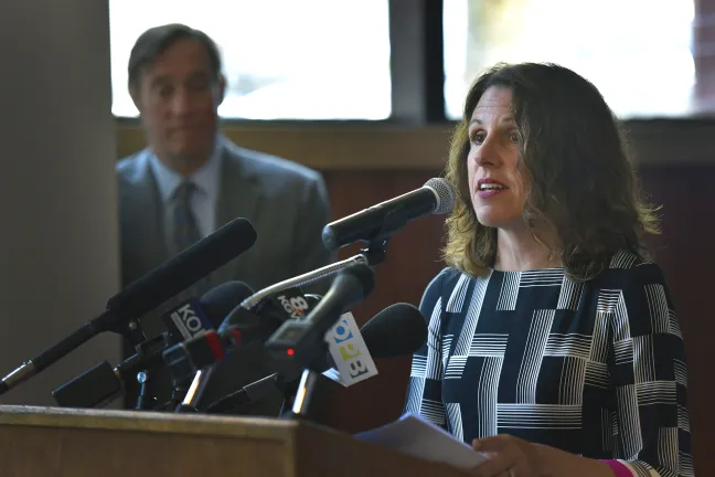Chair Kafoury speaks into a microphone from a podium.