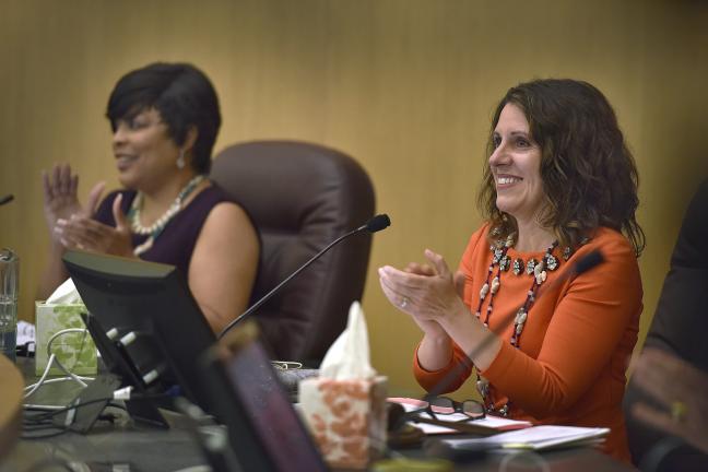 Chair Kafoury (right) and Commissioner Smith applaud during Thursday's festivities.