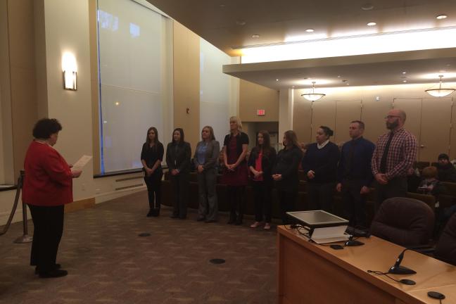 Probation and parole officers being sworn in by Judge Nan Waller