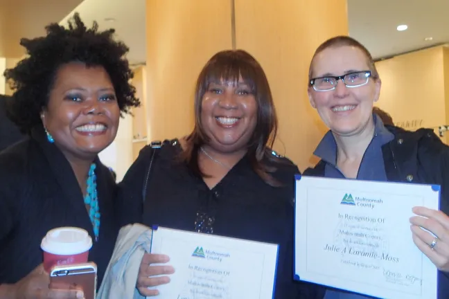 DCJ staff pose for the camera at the 2015 years of service ceremony