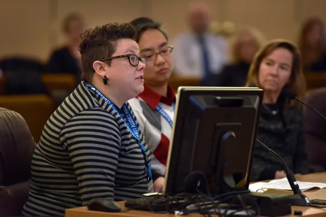 Multnomah County Library's Lyndsey Runyan addresses the board at Tuesday's meeting.
