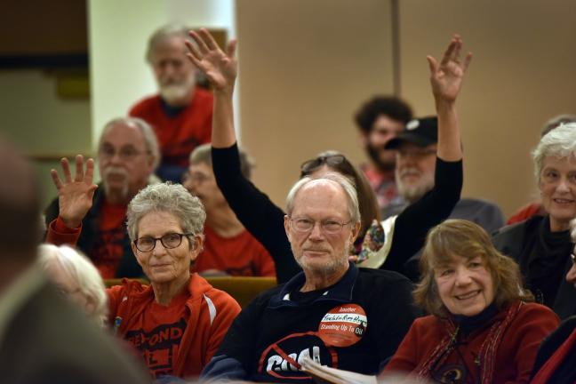 Supporters of Thursday's resolution pack the county board room.