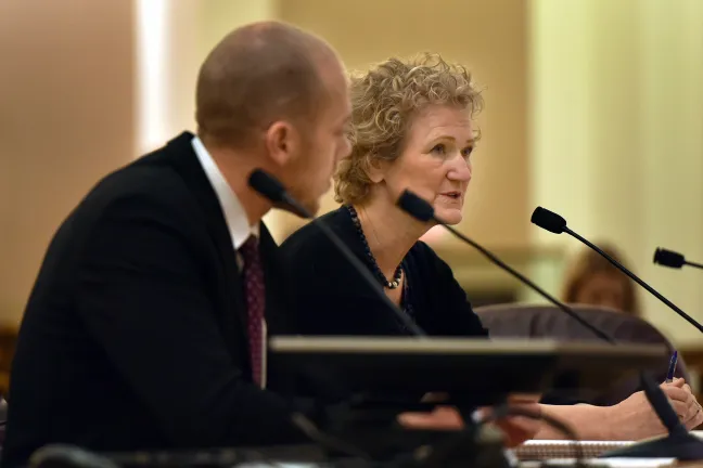 Claudia Black, director of the Office of Government Relations (right) and deputy director of the Office of Government Relations Chris Fick.