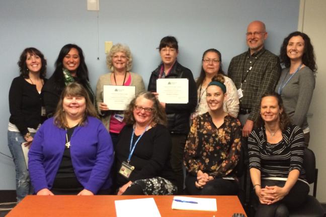 The Health Assessment and Treatment Team pose for a photo to commemorate their nomination. 