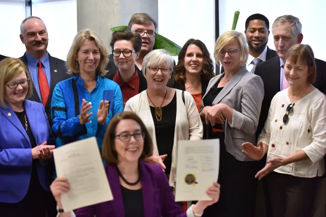 Chair Kafoury stands with local leaders in ceremonial signing of critical housing bills