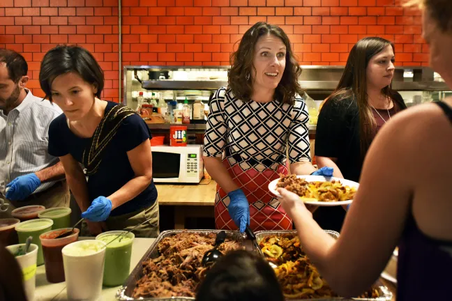 Chair Kafoury serves up tacos at Home Forward's new family shelter