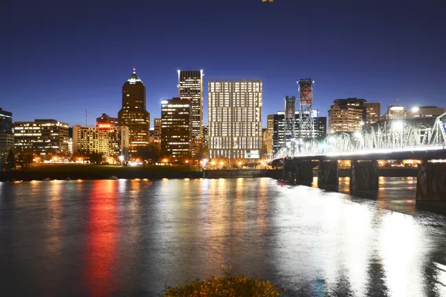 Artist rendering of future central courthouse at night.