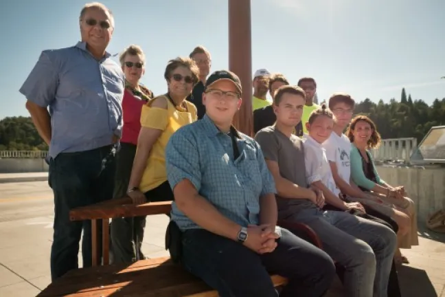 Students from ACE Academy and Centennial High School at bench with Sellwood Bridge team.