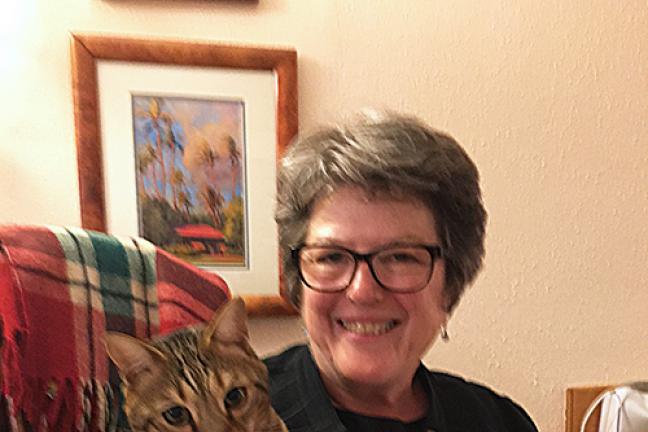 Secretary of State Jeanne Atkins poses with pet and ballot