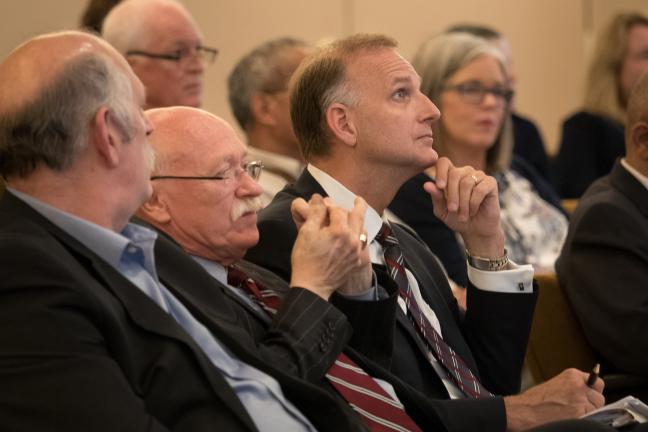 Multnomah County Public Defender Lane Borg, Multnomah County Chief Criminal Judge Edward Jones and Multnomah County District Attorney Rod Underhill listen to presentation.