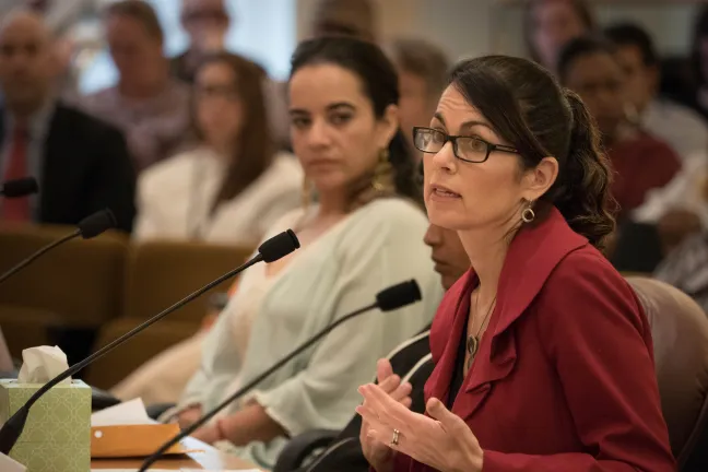 Charese Rohny, a civil rights lawyer, called on white residents to becoming willing to give up some of the privilege that makes them comfortable