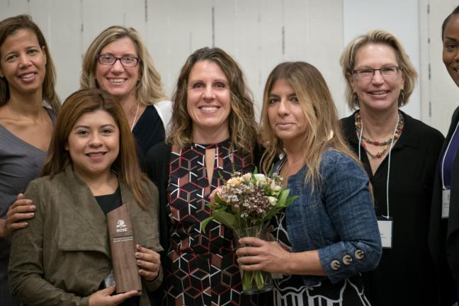 Chair Deborah Kafoury and Health Department directors and staff accept the Community partner award from Rose CDC.