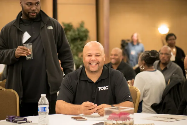Hiag Brown with Portland Opportunities Industrialization Center smiles for camera.