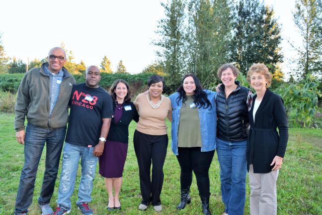 DCJ staff, County Commissioners pose with program participants and partners. 