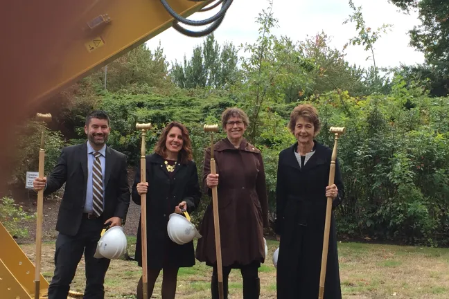 Multnomah County Commissioners pose with smiles and shovels