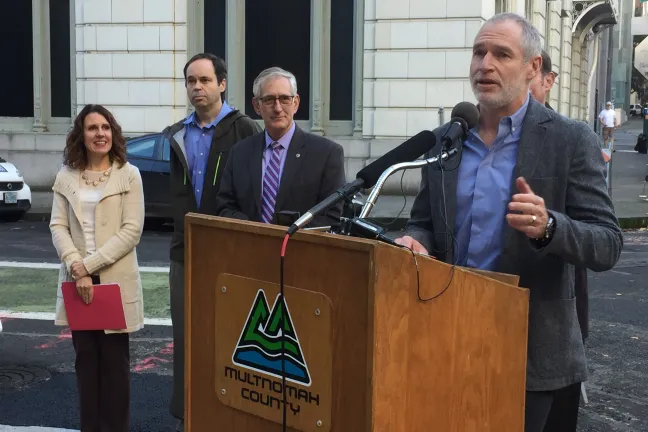 Developer Tom Cody describes the agreement for reporters.