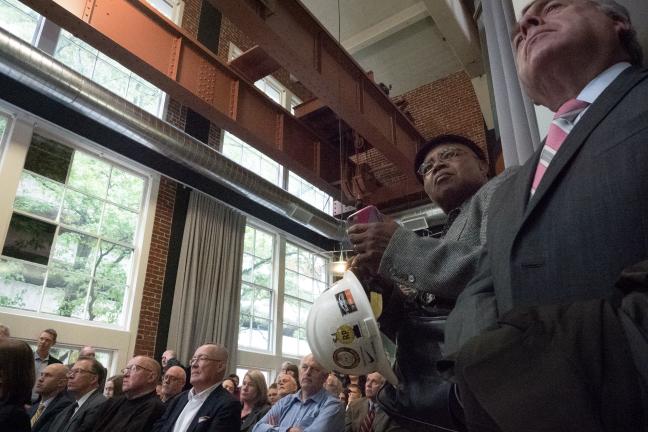 Audience listens to speakers at groundbreaking ceremony for new courthouse