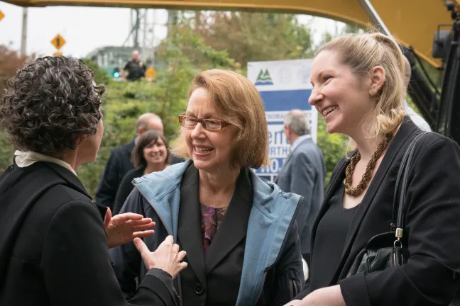 Attorney General Ellen Rosenblum chats with guests at groundbreaking.