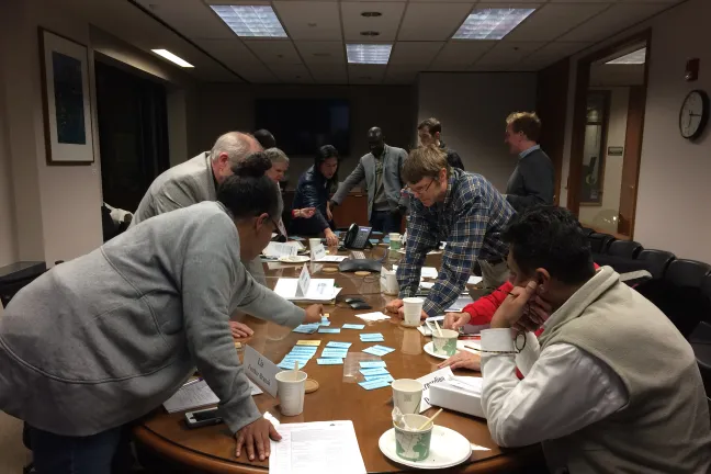 Community Involvement Committee members collaborate at a recent meeting.