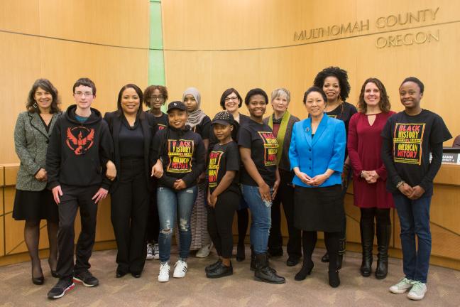 Commissioners and students from Roosevelt High School