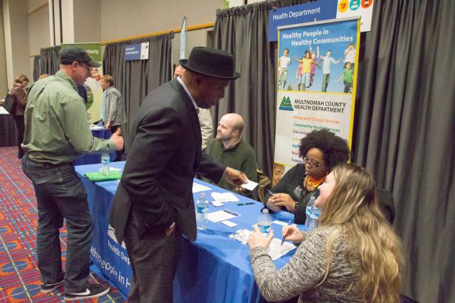 Photo courtesy: Jeremy Jeziorski, Marketing Coordinator with Oregon Convention Center shows guests at a Metro-Multnomah County MWESB Open House