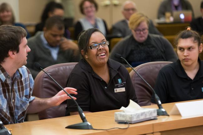 Intern Jazmica Weathers tells the board about her current position at Embassy Suites.