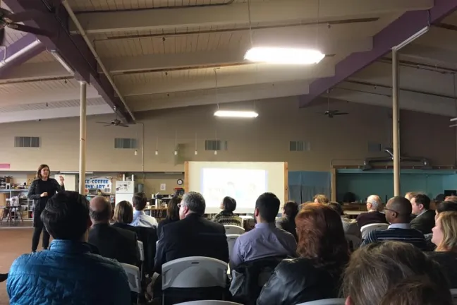 Community members attend an East County Caring Community meeting at the Rosewood Initiative.