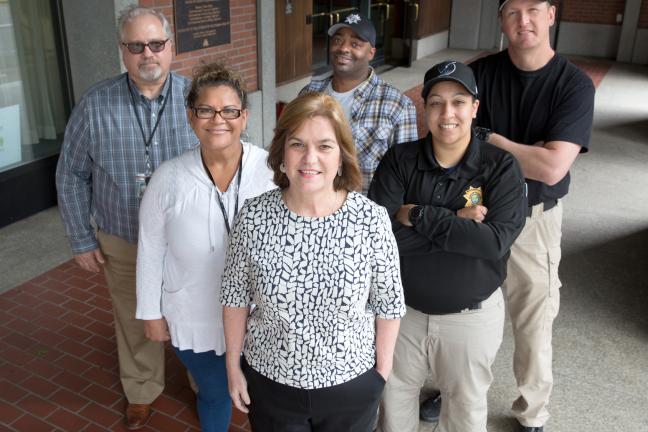 From left: Juvenile Services Division (JSD) Manager Dennis Moore; JSD Counselor Silvia Gomez; Parole and Probation Officer (PPO) Keith Murphy; Adult Services Division Manager Kate Desmond (center); PPO Brie Murphy and PPO Erik Zilz.