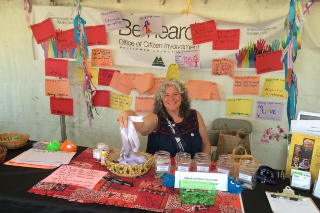 A Multnomah County Office of Community Involvement employee at the 2016 Pride Northwest Festival.