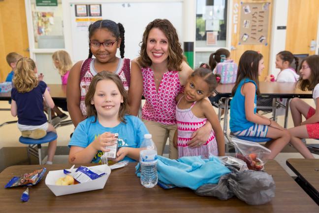 Chair Kafoury with SUN campers having summer meals at Parkrose High.