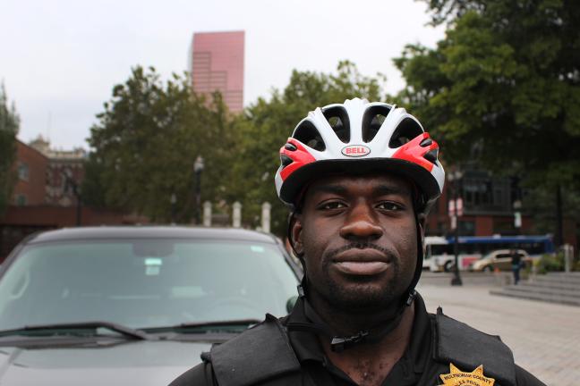 Parole and Probation Officer, Jamiel Brown poses for photo while out in the field. Brown supervises around 50 clients in Southwest Portland