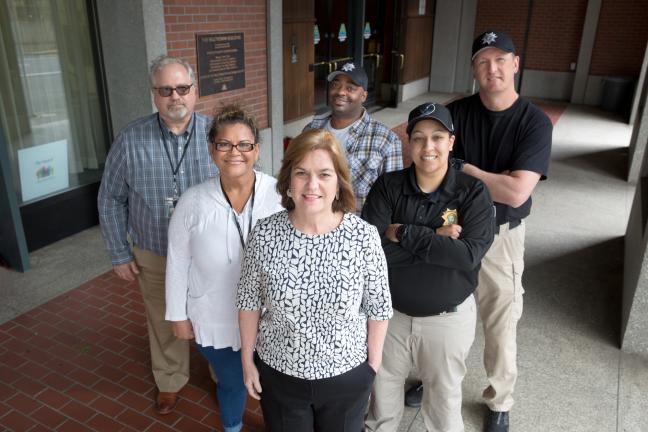 From left: Juvenile Services Division (JSD) Manager Dennis Moore; JSD Counselor Silvia Gomez; Parole and Probation Officer (PPO) Keith Murphy; Adult Services Division Manager Kate Desmond (center); PPO Brie Murphy and PPO Erik Zilz.