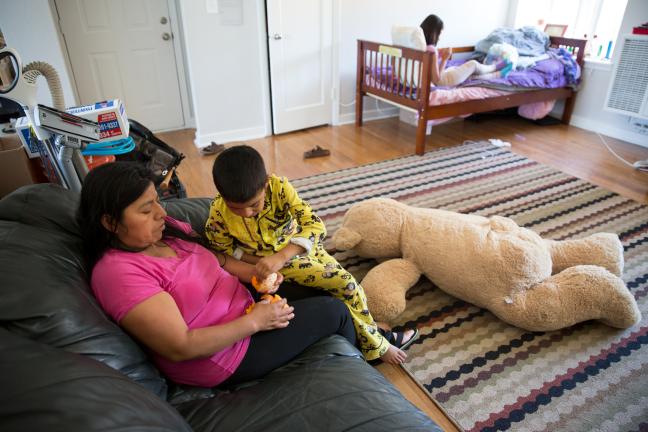 The family's living room doubles as a bedroom for their 12-year-old daughter Beatriz.