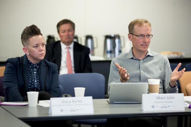 A Home for Everyone co-chair Stacy Borke of Transition Projects, left, with director Marc Jolin during the coalition's Aug. 21, 2017, executive committee meeting.