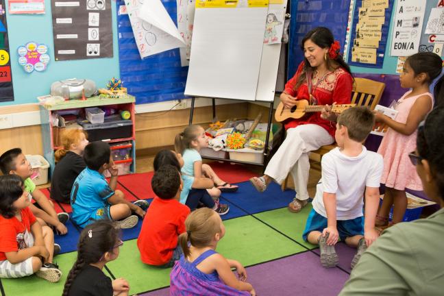 Amparo Garcia-Yurchenco leads a class in song as part of the Early Kindergarten Transition program.