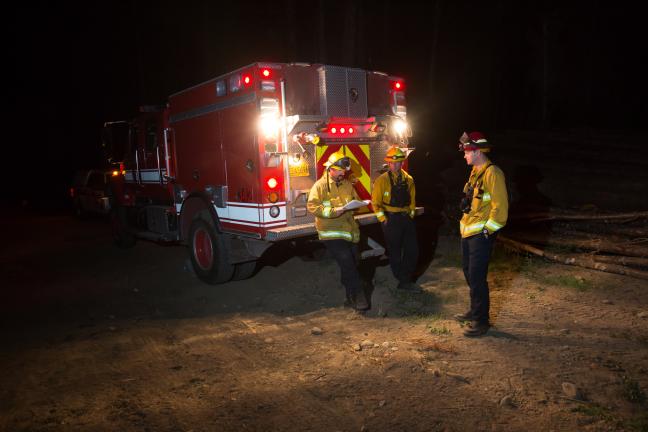 Firefighters work late into the night on the Eagle Creek Fire